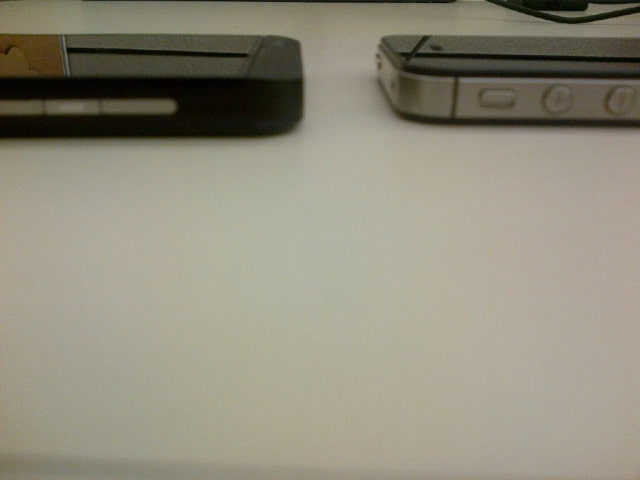 Leaked Photos of the Upcoming BlackBerry Z10 Next to the iPhone 4S