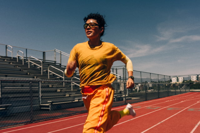 A runner wearing Apple Watch Series 12
