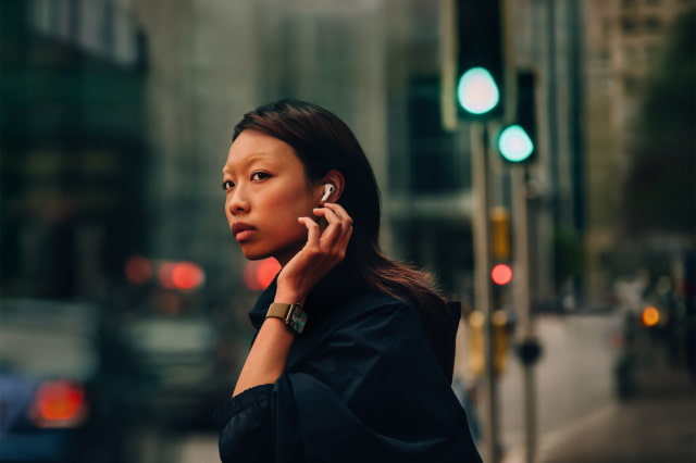 A person wearing Apple Watch Series 10 in a city