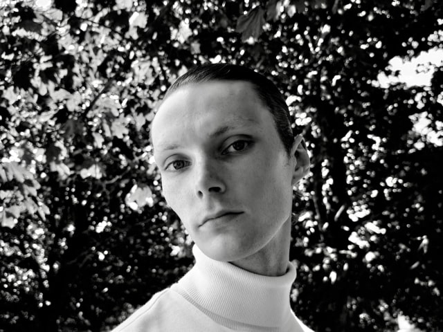 Black-and-white portrait supplied by Apple to illustrate variable-aperture photography