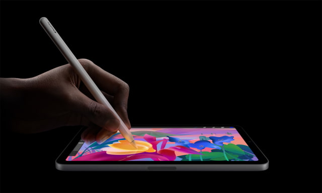A person drawing on iPad mini with Apple Pencil Pro