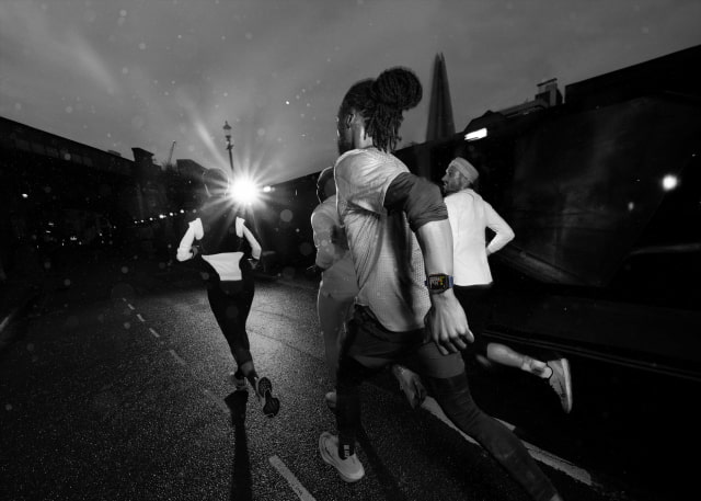 Runners outdoors wearing Apple Watch Ultra 2