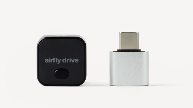 Black AirFly Drive adapter beside the included USB-A to USB-C adapter.