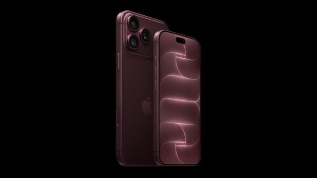 Front and rear views of the burgundy iPhone 18 Pro against a black background