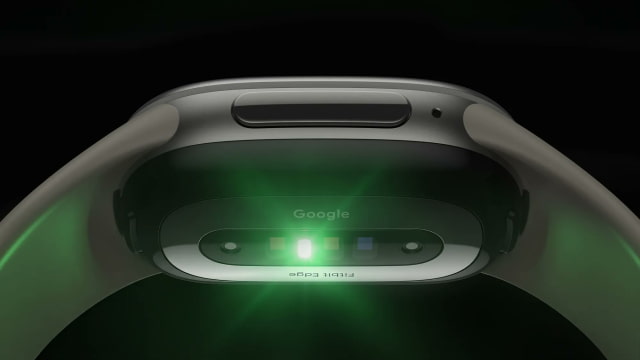 Underside of Fitbit Edge showing its health sensors and physical side button
