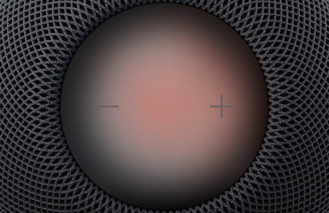 The glowing top surface of a midnight HomePod mini 2 with Sound Glow.