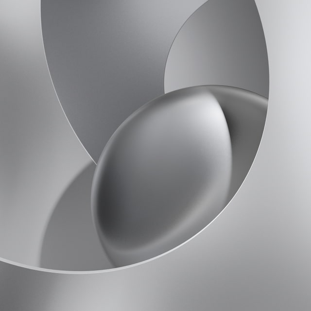 Official Apple HomeView Silver wallpaper with sculpted metallic ribbons surrounding a shaded sphere