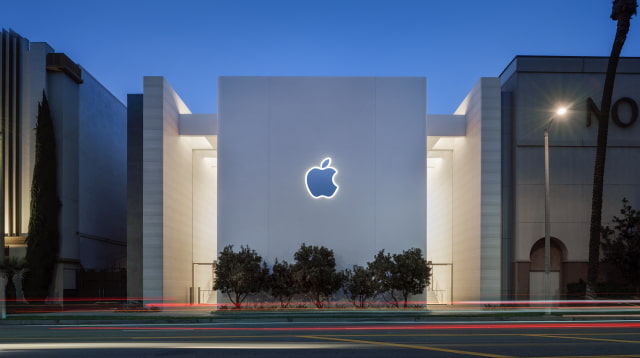 Exterior of Apple The Grove in Los Angeles at dusk.