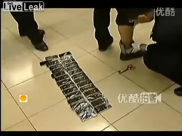 Watch Customs Bust a Guy With Nearly 170 iPhones Wrapped Around His Body [Video]