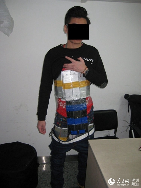 Chinese Smuggler Caught With 94 iPhones Strapped to His Body [Photos]