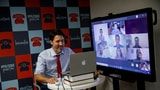 Canadian Prime Minister Justin Trudeau Mocked for Using Fake MacBook [Photo]