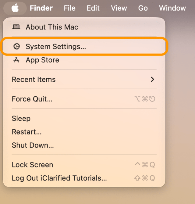 The Apple menu open with System Settings&hellip; ringed