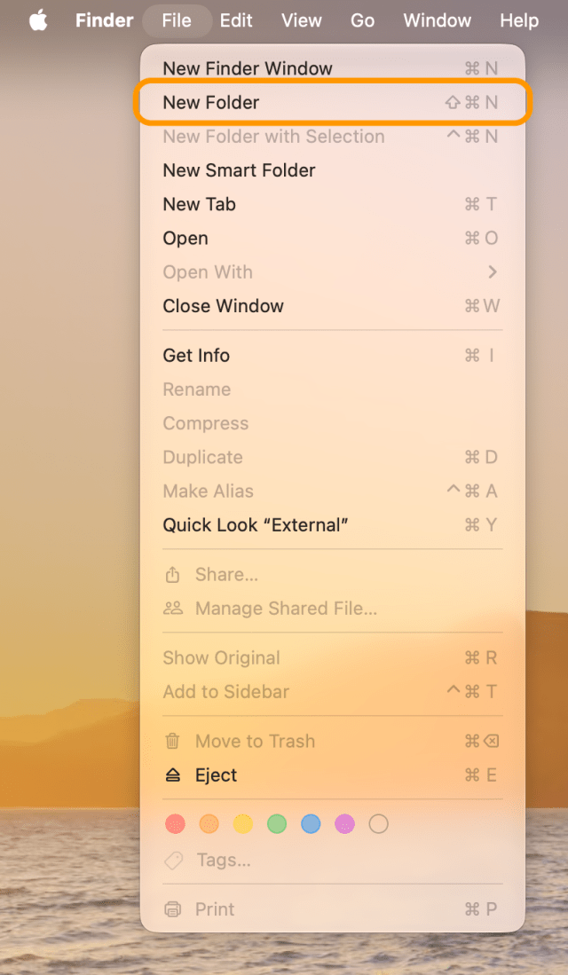 The File menu open with New Folder ringed