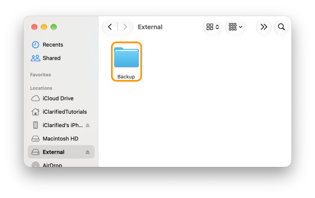 The drive External in Finder with its Backup folder ringed