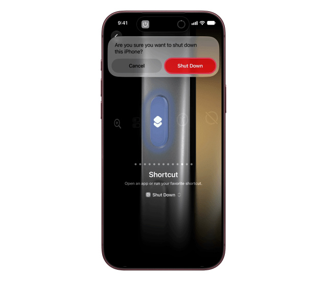 Shut Down outlined on the alert asking whether to shut down this iPhone.